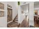 Hallway with stairs and ornate wooden doors leading to other parts of the house at 3883 Desert Marina Dr # 245, Laughlin, NV 89029