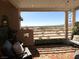 Expansive covered patio with picturesque views, comfortable seating, and decorative accents, perfect for outdoor living at 3883 Desert Marina Dr # 245, Laughlin, NV 89029