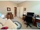 Bedroom featuring a loveseat and desk for working at 4058 Helens Pouroff Ave, North Las Vegas, NV 89085