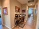 Hallway featuring tile flooring and a drink preparation area at 4058 Helens Pouroff Ave, North Las Vegas, NV 89085