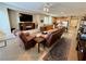 Open floor plan living room featuring tile flooring and neutral decor at 4058 Helens Pouroff Ave, North Las Vegas, NV 89085