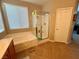 Main bath featuring tub and separate glass enclosed shower at 4058 Helens Pouroff Ave, North Las Vegas, NV 89085