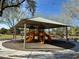 Shaded playground with slides offers a fun and safe recreational space for children at 4058 Helens Pouroff Ave, North Las Vegas, NV 89085