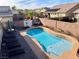 Inviting pool area complete with ample lounge seating and manicured surroundings, ideal for entertaining at 4058 Helens Pouroff Ave, North Las Vegas, NV 89085