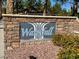 Stone community sign reading 'Waterfall' set amidst landscaped grounds at 4058 Helens Pouroff Ave, North Las Vegas, NV 89085