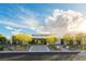 A modern home nestled in a desert landscape, showcasing sleek lines and neutral tones at 41 Crested Cloud Way, Las Vegas, NV 89135