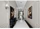 Elegant hallway with exquisite artwork and lighting at 41 Crested Cloud Way, Las Vegas, NV 89135