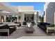 Spacious patio offers stylish seating and access to the home's elegant interior and dining area at 41 Crested Cloud Way, Las Vegas, NV 89135