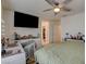 Bedroom with ceiling fan and flat screen TV at 4115 Spring Storm Ave, North Las Vegas, NV 89081