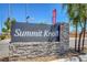 Summit Knoll community sign made of stone with mature landscaping at 4115 Spring Storm Ave, North Las Vegas, NV 89081