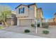 Charming two-story home featuring a two-car garage and low-maintenance landscaping at 4115 Spring Storm Ave, North Las Vegas, NV 89081