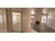 Spacious living room with fireplace, ceiling fan, and modern vinyl floors at 4555 Sahara Ave # 252, Las Vegas, NV 89104