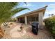 Outdoor space featuring a barbecue grill, seating, and stone landscaping at 4557 Bersaglio St, Las Vegas, NV 89135