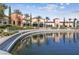 Stunning exterior view of the clubhouse overlooking the tranquil pond at 4557 Bersaglio St, Las Vegas, NV 89135