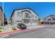 Well-maintained townhome with attached garages, balcony, and attractive landscaping at 4640 Flower Moon Ave # 102, North Las Vegas, NV 89084