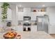 Close-up of kitchen featuring granite countertops and stainless steel appliances at 4640 Flower Moon Ave # 102, North Las Vegas, NV 89084