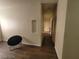 Hallway features neutral walls, modern flooring, and an arched display niche at 4730 E Craig Rd # 1106, Las Vegas, NV 89115