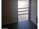 Hallway or bathroom window with textured glass and a wood floor at 4770 Topaz St # 79, Las Vegas, NV 89121