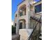 Exterior view of the condo complex showcasing the architecture, stairs and landscaping at 4854 Nara Vista Way # 201, Las Vegas, NV 89103