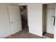 Bedroom featuring a closet and a door at 5750 E Hacienda Ave # 202, Las Vegas, NV 89122