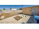 Backyard with a cracked concrete patio, and aged shed, enclosed by a block wall, needs landscaping at 6120 Cairo Cir, Las Vegas, NV 89107