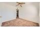 Bedroom with a ceiling fan and doorway to another room at 6120 Cairo Cir, Las Vegas, NV 89107