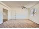 Bedroom with neutral carpet, white walls, a ceiling fan, window with blinds, and closet at 6120 Cairo Cir, Las Vegas, NV 89107