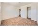 Carpeted bedroom with a closet and view to the doorway at 6120 Cairo Cir, Las Vegas, NV 89107