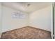 Neutral bedroom featuring plush carpeting, bright window, and neutral paint at 6120 Cairo Cir, Las Vegas, NV 89107