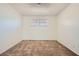 Neutral bedroom featuring plush carpeting, bright window, and neutral paint at 6120 Cairo Cir, Las Vegas, NV 89107