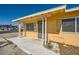 Covered front porch with security door and supports at 6120 Cairo Cir, Las Vegas, NV 89107