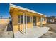 Covered front porch with security door at 6120 Cairo Cir, Las Vegas, NV 89107