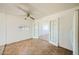 Sunny kitchen features tile flooring, white appliances, and view into other rooms through double doors at 6120 Cairo Cir, Las Vegas, NV 89107