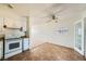 Well-lit kitchen with white cabinets, tile floors, and a view into a carpeted living area at 6120 Cairo Cir, Las Vegas, NV 89107