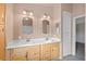 Bathroom featuring a double vanity with two sinks, providing ample space and convenience for a modern lifestyle at 6217 Sadler Dr, Las Vegas, NV 89130