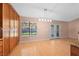 Dining room area featuring ample lighting, a window and light wood flooring at 6217 Sadler Dr, Las Vegas, NV 89130