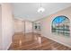 Inviting living area with plenty of natural light through arched windows at 6217 Sadler Dr, Las Vegas, NV 89130