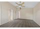 A neutral main bedroom features neutral carpet and multiple entry ways at 6217 Sadler Dr, Las Vegas, NV 89130