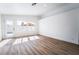 Bright and airy living room featuring large windows and smooth flooring, offering a blank canvas at 6505 Moon Roses Ct, Las Vegas, NV 89108