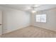 Bedroom featuring carpeted floor and a window at 74 Harbor Coast St, Las Vegas, NV 89148