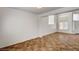 Spacious living room featuring tiled flooring, bright walls, and large windows for natural light at 74 Harbor Coast St, Las Vegas, NV 89148