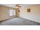 Bedroom with neutral carpet, natural light from window, and soft color walls at 7623 Calm Passage Ct, Las Vegas, NV 89139