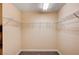 Empty walk-in closet with wire shelving and carpeted floor at 7623 Calm Passage Ct, Las Vegas, NV 89139