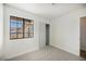 Bedroom with neutral carpet, a window, and closet at 764 Biaritz Ave, Las Vegas, NV 89123