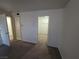 View of the carpeted bedroom with the walk-in closet at 7730 Secret Shore Dr # 207, Las Vegas, NV 89128