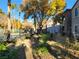 Exterior view of the community pool area and landscaping around the apartment complex in a serene setting at 7730 Secret Shore Dr # 207, Las Vegas, NV 89128