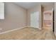 Bedroom with closet, neutral walls, carpet, and a window at 7978 Light Tower St, Las Vegas, NV 89139