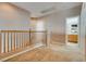 Hallway and loft area with neutral walls and carpet at 7978 Light Tower St, Las Vegas, NV 89139