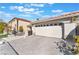 Attached two car garage and paved driveway at 8520 Copper Falls Ave, Las Vegas, NV 89129