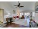 Living room featuring hardwood floors and sliding glass doors to the backyard at 8808 Litchfield Ave, Las Vegas, NV 89134